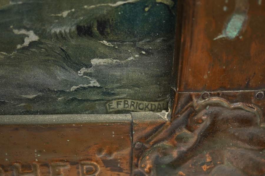 An Arts & Crafts copper picture frame embossed with shells and titled ‘St. Christopher’, housing a print of Saint Christopher carrying the christ child, 46 x 36cm